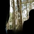 The 33-year-old woman says she was raped by two men
