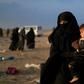 US-backed fighters on Friday trucked some 2,000 people out of the Islamic State group's last scrap of territory in eastern Syria