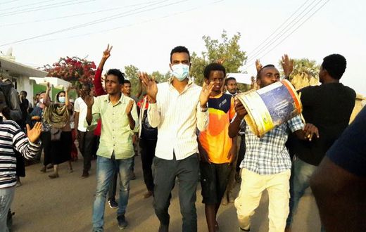 Sudanese protesters chant slogans during a demonstration against President Omar al-Bashir in the capital Khartoum's twin city of Omdurman on January 29, 2019