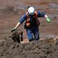 Firefighters search for victims on January 31, 2019 after a dam collapsed at an iron-ore mine belonging to mining giant Vale, near Brumadinho in southeastern Brazil