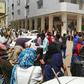 Sudanese protesters take part in an anti-government demonstration in Khartoum, as the government threatened legal action against the movement leaders