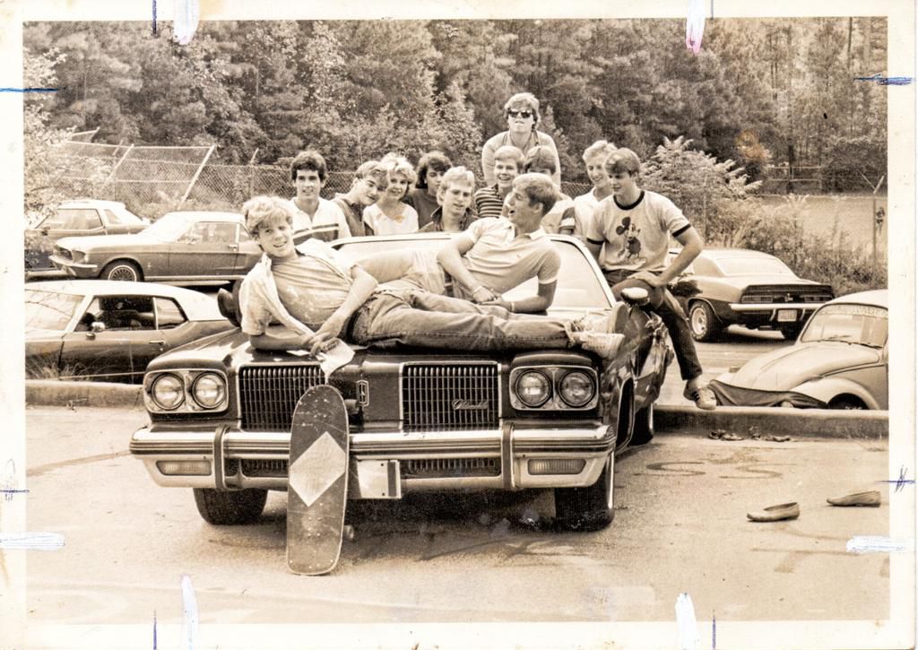 The author (front, left) on the hood of a buddys Delta 88 with his very first skateboard, a Variflex Vectra, senior year, Ridgeview High School, 1985.