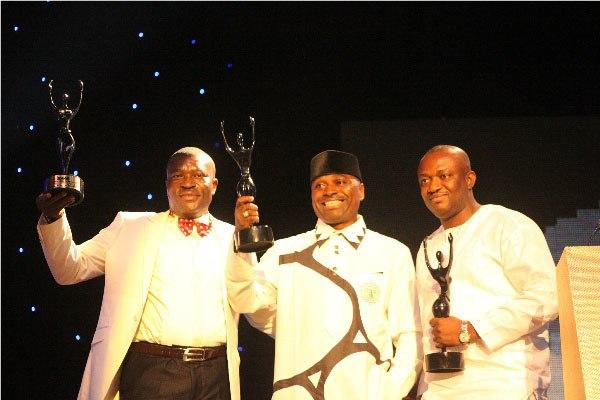 Kenneth Okonkwo and Kanayo O.Kanayo with Rep from Tunde Kilani at the 2013 AMAA