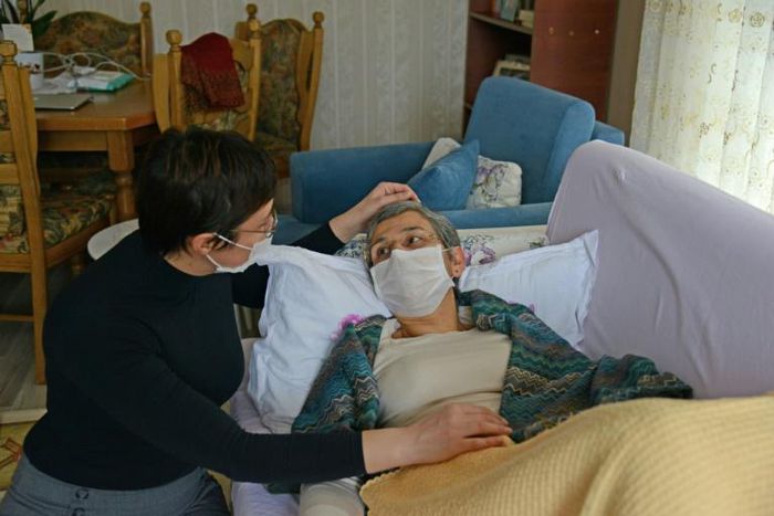 Guven's daughter Sabiha Temizkan (L) is constantly by her mother's side