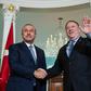 Turkish Foreign Minister Mevlut Cavusoglu (L, pictured November 2018) said after a phone call with US Secretary of State Mike Pompeo that he finds "correct his statement about the removal [from Syria] of the elements that concern Turkey"