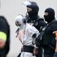 Police officers of a special unit escort Iraqi asylum-seeker Ali Bashar, pictured June 2018, who is accused of beating, raping and then strangling to death a German schoolgirl