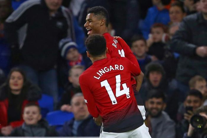 Manchester United's Marcus Rashford celebrates with Jesse Lingard