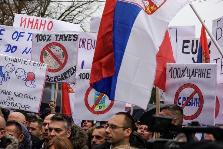 Kosovo Serbs take part in a protest in the northern town of Mitrovica in November 2018, following Kosovo's move to slap Serbian imports with a 100 percent tariff