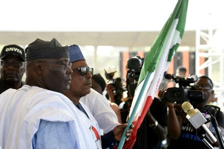 The chairman of Nigeria's opposition PDP party, Uche Secondus (rear R) , accused the government of seeking to rig upcoming elections