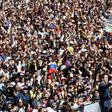 Venezuela's opposition leader Juan Guaido takes a selfie in front of a huge adoring crowd in Caracas