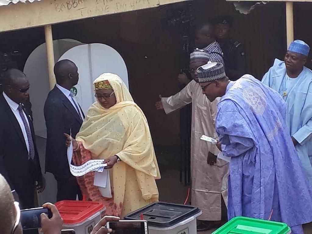 Nigeria's Buhari checks wife's ballot to see who she voted for