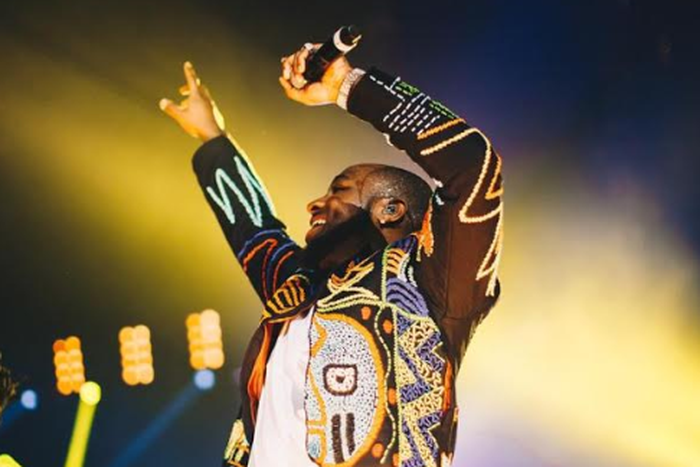 Davido wears a hand-beaded OKUNOREN jacket at his sold-out concert