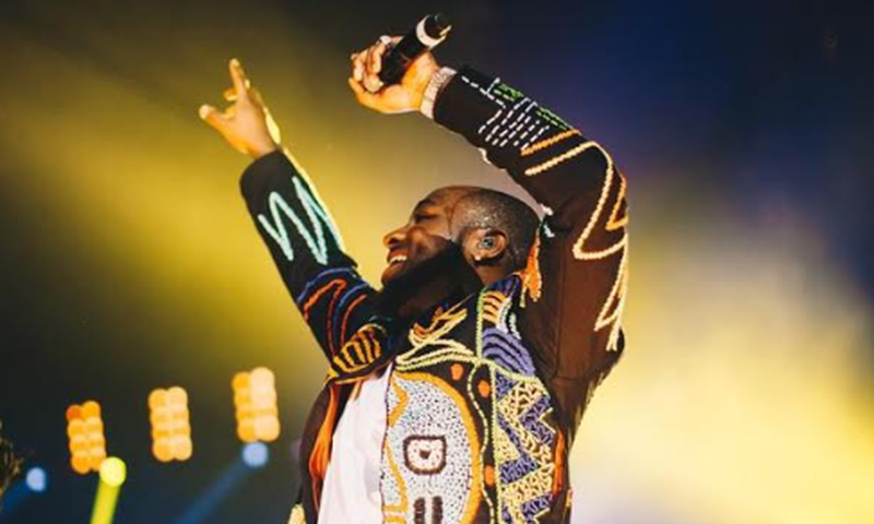 Davido wears a hand-beaded OKUNOREN jacket at his sold-out concert