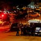 The gunman holed up in his building after opening fire in the street