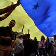 Opposition demonstrators rally in Caracas against President Nicolas Maduro, ordered the United States to pull its diplomats out of Venezuela