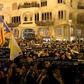People hold placards reading "Self determination is a right, not a crime" in Barcelona on February 1, during a demonstration in support of jailed Catalan pro-independence leaders