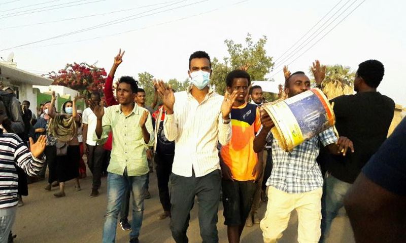 Sudanese protesters chant slogans during a demonstration against President Omar al-Bashir in the capital Khartoum's twin city of Omdurman on January 29, 2019