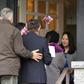December 12, 2018 Meng Wanzhou (R), Chief Financial Officer of Huawei Technologies, is seen answering the door December 12, 2018 after she was released on bail in Vancouver, British Columbia