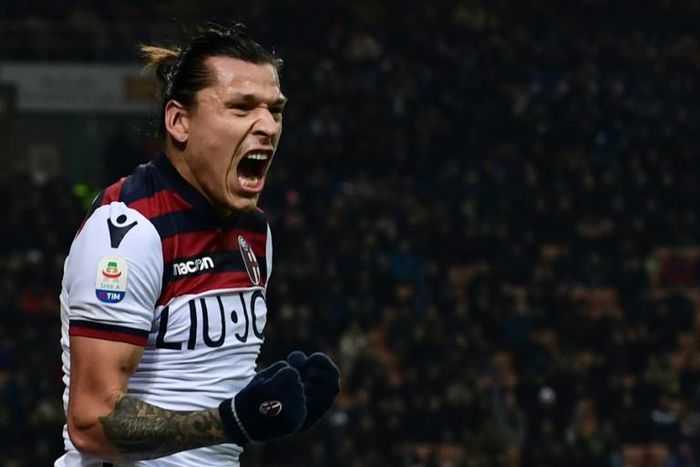Paraguayan forward Federico Santander sealed a first win for Bologna in over four months in the San Siro