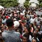 Election call: People in Lagos gathered ahead of polling day to pick up the biometric card entitling them to vote