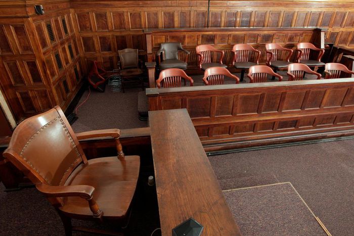 A view of the witness stand (L) and the jury box (rear) in court room 422 of the New York Supreme Court at 60 Centre Street February 3, 2012