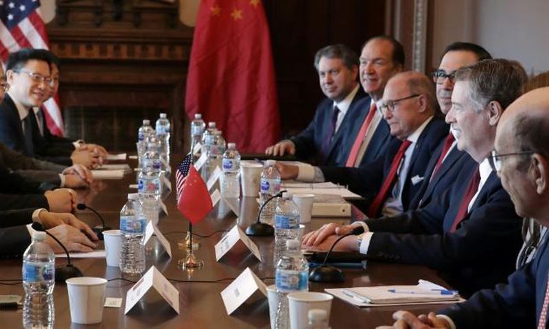 Beijing's trade envoy Liu He (L) meets with US Trade Representative Robert Lighthizer (R) at the Eisenhower Building near the White House