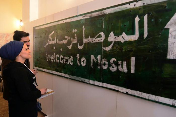A ‘Welcome to Mosul’ sign on display at an exhibition in the Iraqi city on January 29, 2019