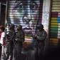 Soldiers stand guard near the presidential palace in Caracas on August 4, 2018, after the government said drones loaded with explosives detonated near President Nicolas Maduro during a military ceremony