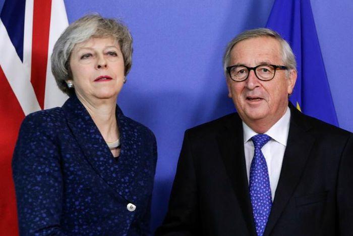 British Prime Minister Theresa May welcomed by European commission President Jean-Claude Juncker in Brussels on Thursday