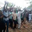 Buhari supporters jubilating at Atiku's polling unit (Twitter @daily trust