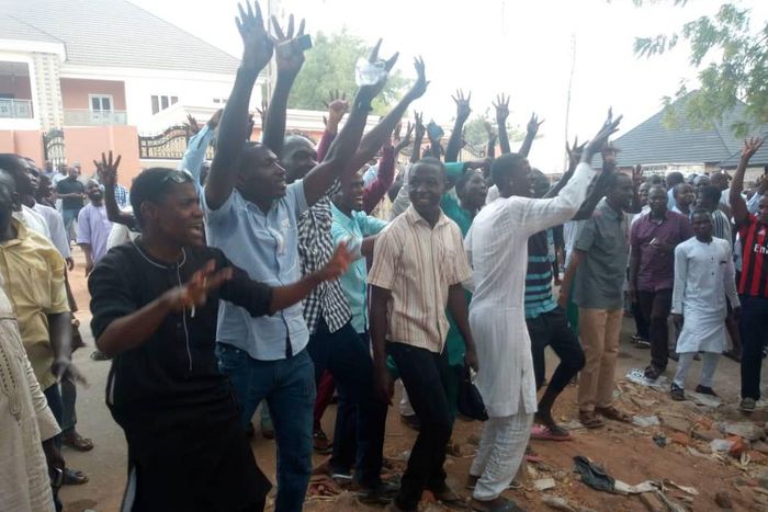 Buhari supporters jubilating at Atiku's polling unit (Twitter @daily trust