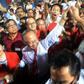 Singaporean presidential candidate Tan Cheng Bock (2nd-L) greeting his supporters in 2011 when he stood as candidate of the presidential elections in Singapore