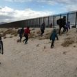 US President Donald Trump says he is determined to build a multi-billion dollar wall along key sections of the US-Mexico border in order to prevent illegal immigrants from crossing into the country