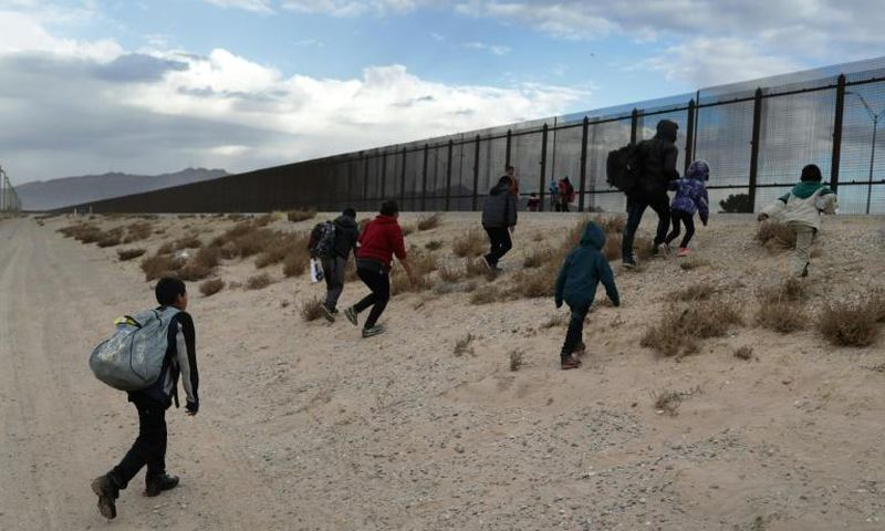 US President Donald Trump says he is determined to build a multi-billion dollar wall along key sections of the US-Mexico border in order to prevent illegal immigrants from crossing into the country