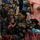 Refugee children sing "Happy Birthday" at the celebration to mark their American birthdays in Kansas city, Missouri