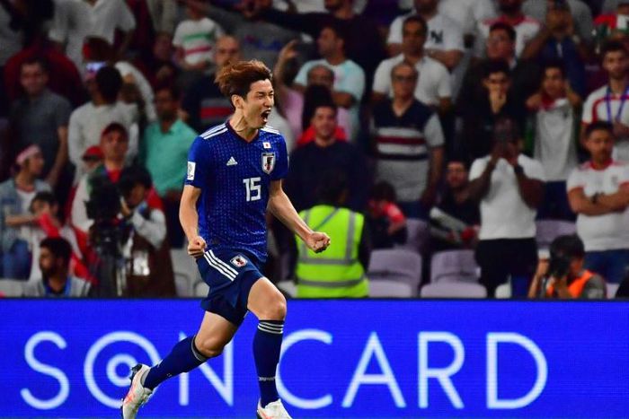 Yuya Osako celebrates his second goal as Japan qualify for the Asian Cup final