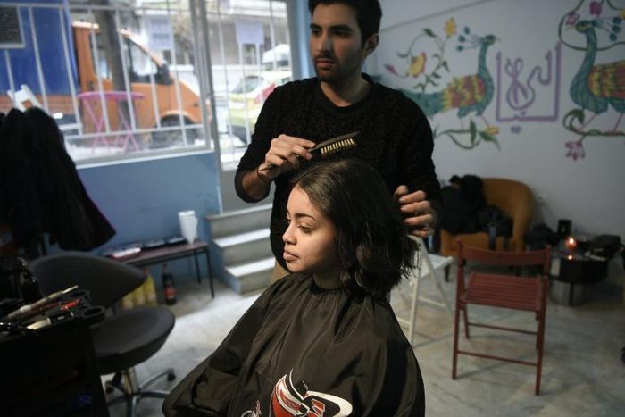 Manassif Raza opened his own hair salon in Athens after escaping poverty in Pakistan and spending two years in Greece doing whatever work he could get