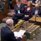 Prime Minister Theresa May faces a bid by MPs to force a new approach on Brexit