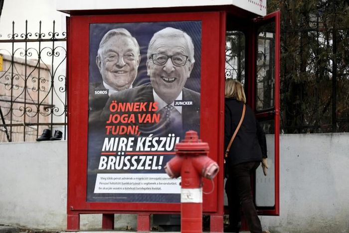 Angela Merkel has voiced backing for European Commission chief Jean-Claude Juncker in a row between him and Hungarian Prime Minister Viktor Orban