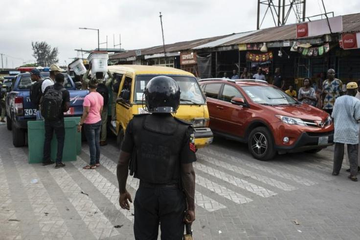 In Lagos, vehicles expected to distribute ballots and staff failed to arrive on time