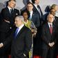 Israeli Prime Minister Benjamin Netanyahu greets participants before a dinner at a conference in Warsaw on the Middle East