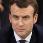 French president Emmanuel Macron (centre) takes part in a meeting in Evry-Courcouronnes, on February 4, 2019