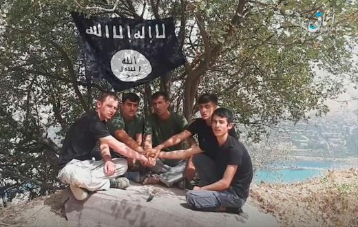 A image taken from a video released by The Islamic State's (IS) Amaq News Agency on July 31, 2018, allegedly shows the five executors of an attack on foreign tourists on a bike tour in southern Tajikistan