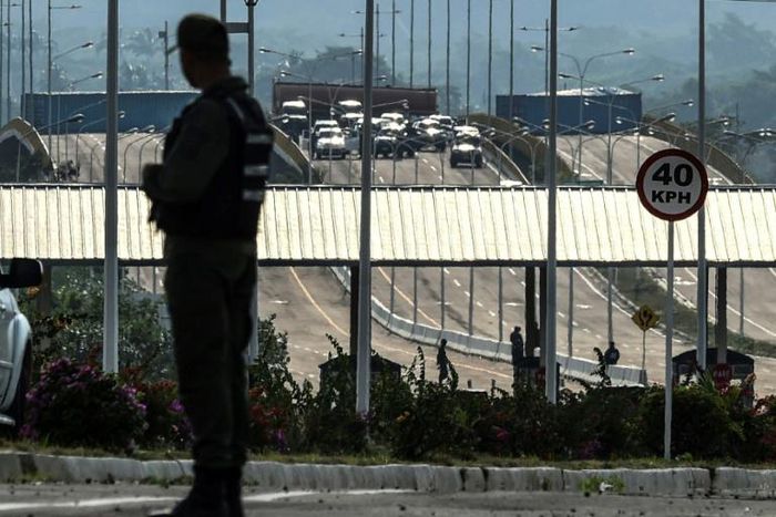 Venezuela's government has beefed up the armed forces guarding a reinforced blockade on the border with Colombia where opposition leader Juan Guaido wants to bring in humanitarian aid