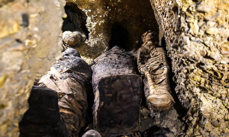 Newly-discovered mummies wrapped in linen found in burial chambers dating to the Ptolemaic era (323-30 BC) at the necropolis of Tunah Al-Gabal in Egypt's southern Minya province