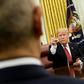 President Donald Trump gestures near Chinese Vice Premier Liu He at the White House on January 31, 2019
