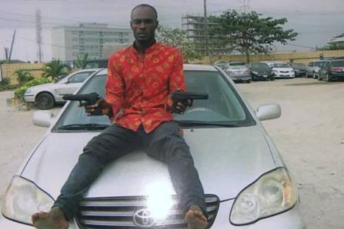 The police in Lagos are on a lookout for a carjacker who snatched a vehicle from an Uber driver alongside his partner pictured with a pair of wooden gun. [Sahara Reporters]