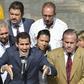 Venezuela's opposition leader and self-proclaimed acting president Juan Guaido speaks to the press at the Federal Legislative Palace, in Caracas, on February 4, 2019