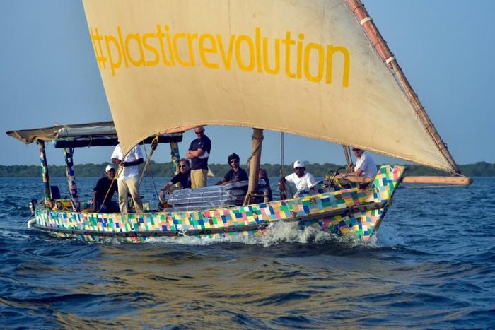 The boat is covered in a brightly-coloured patchwork of 30,000 flip-flops, which like the rest of the raw material was collected from Kenyan beaches and towns