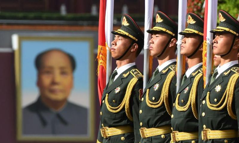 Chinese soldiers outside the Great Hall of the People in Beijing on June 7, 2018